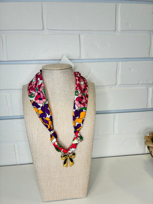 SCARF CHARM NECKLACE – PINK AND PURPLE FLORAL PRINT WITH GOLD BOW PENDANT