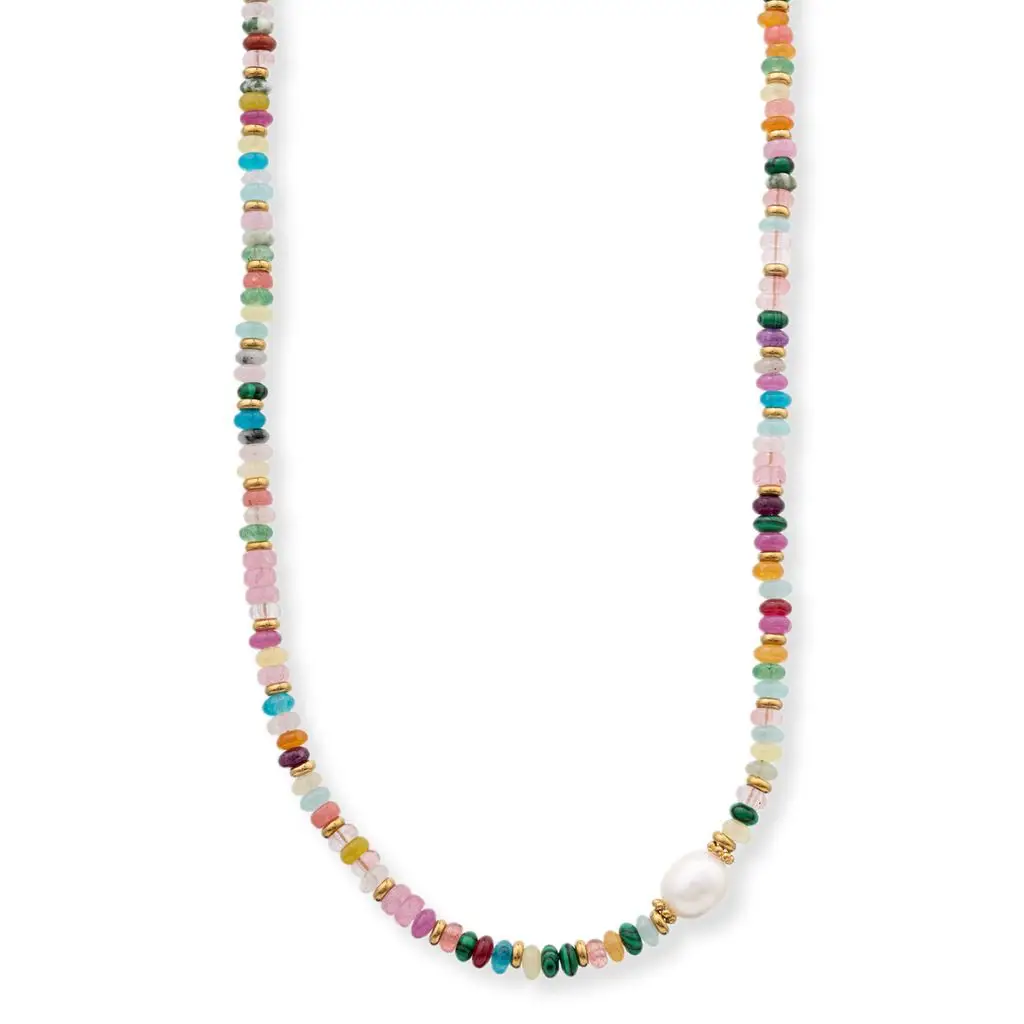 A beaded necklace featuring a mix of colorful round and oval beads small gold spacer beads and a white pearl at the bottom center, displayed on a clean white background.