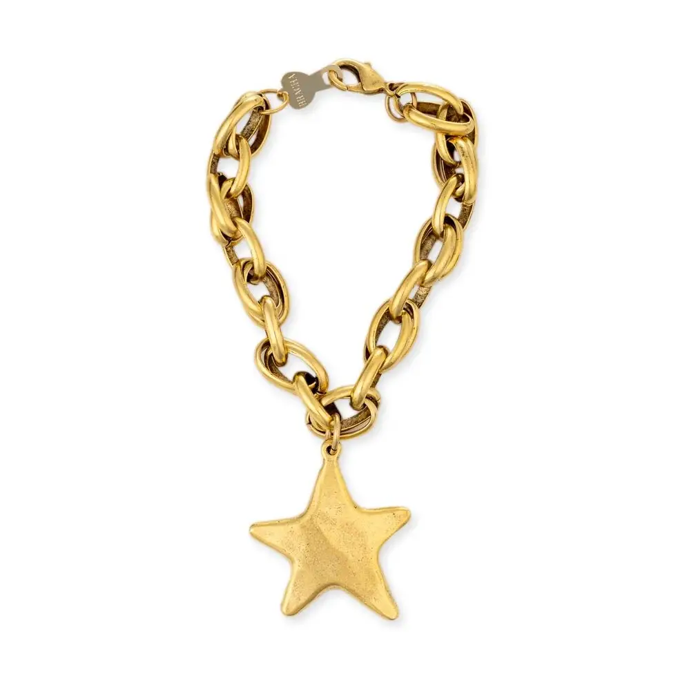 A gold-tone chunky chain bracelet with a dangling textured star charm, shown on a plain white background.