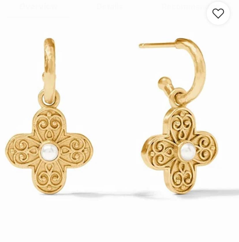 A pair of gold drop earrings with a cross design, featuring an ornate filigree pattern and a small white pearl at the center, shown on a white background.