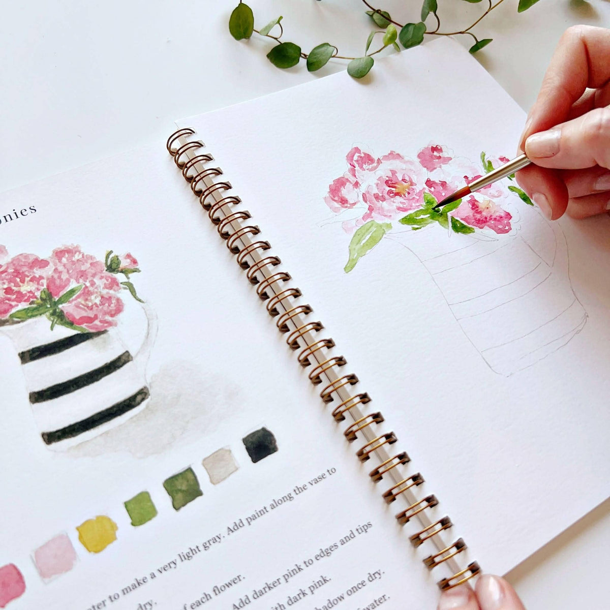 Painting pink flowers in the Bouquets workbook