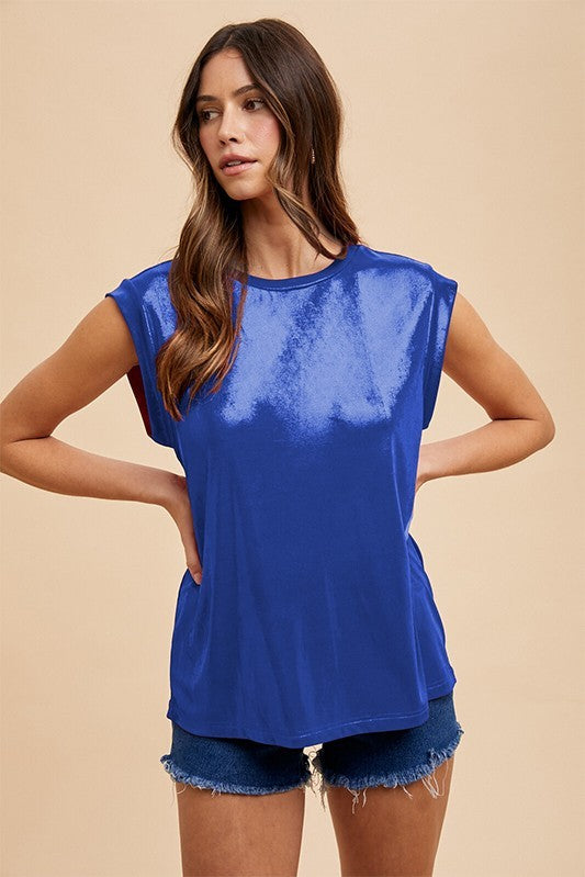Woman wearing a Royal Blue blue Metallic sleeveless top 