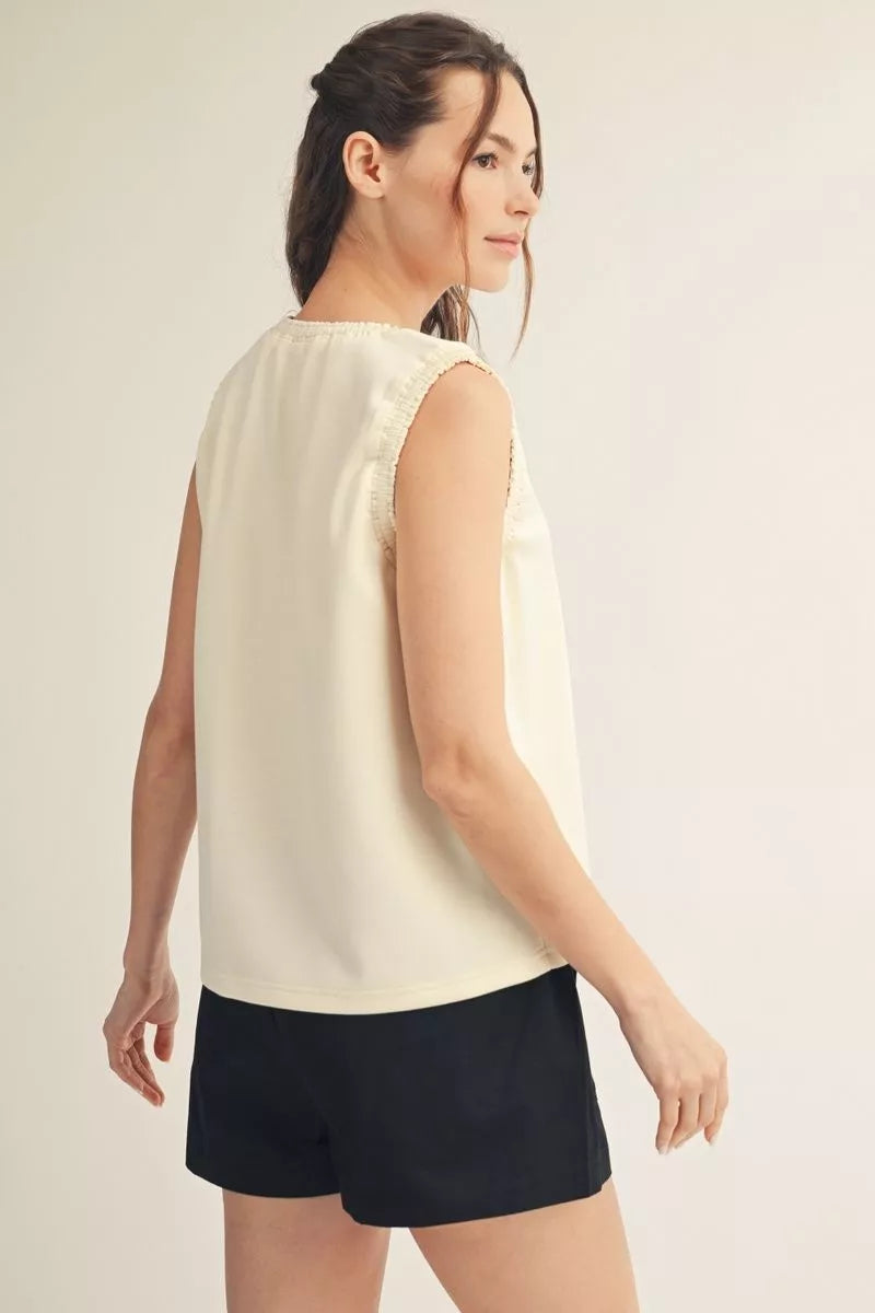 Back view of the ivory smocked edge tank top