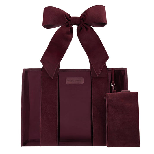 Red velvet bow jelly tote bag with matching velvet zipper pouch, front view