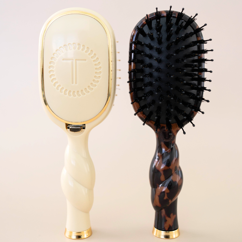 Two TELETIES mini brushes in different colors side by side