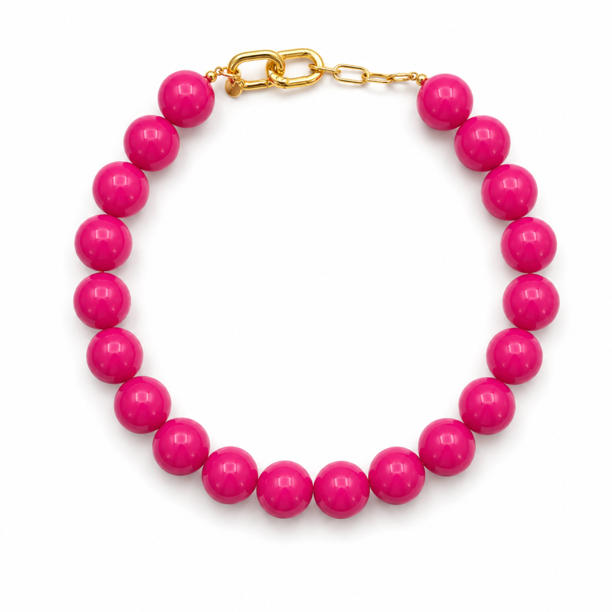 A beaded necklace made of glossy hot pink round beads with a gold-tone clasp, shown on a plain white background.