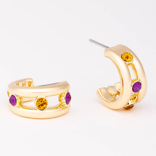 Gold hoop earrings with purple and yellow gemstones on a white background