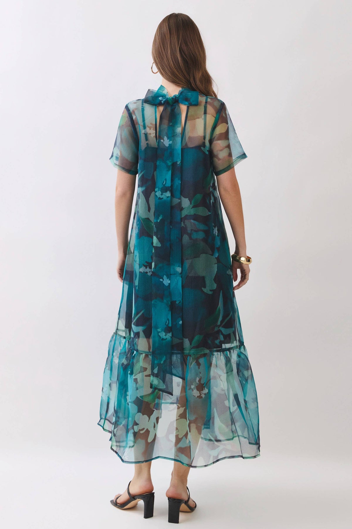 back view teal floral sheer overlay midi dress with tie bow sash at neckline