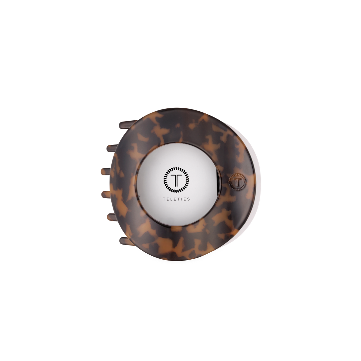 Underside of the Tortoise medium flat circle hair clip showing the TELETIES logo