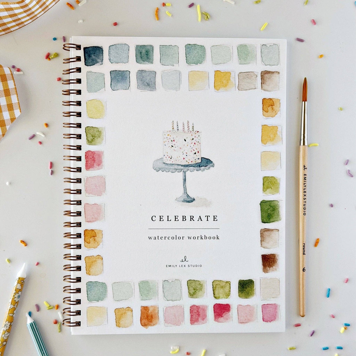 Celebrate watercolor workbook cover with a birthday cake
