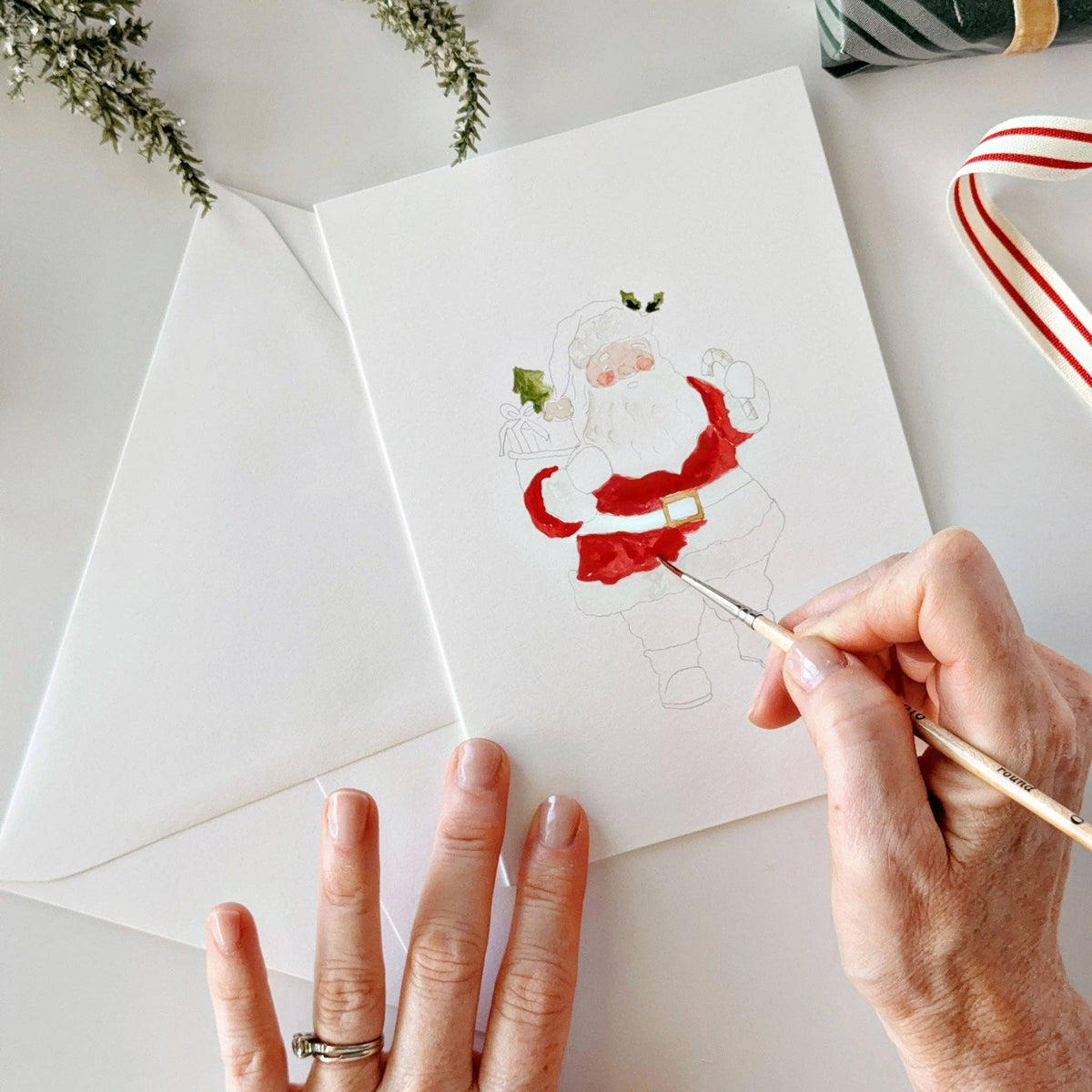 Painting Santa on a paintable Christmas notecard