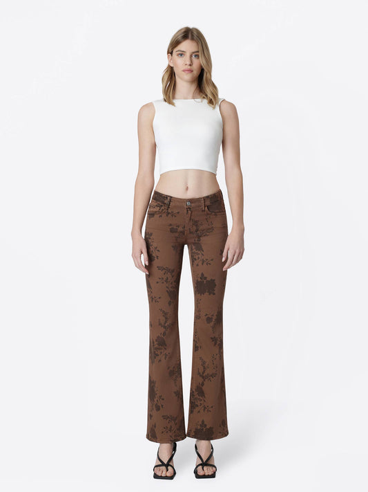 brown tone on tone floral jeans on a white background