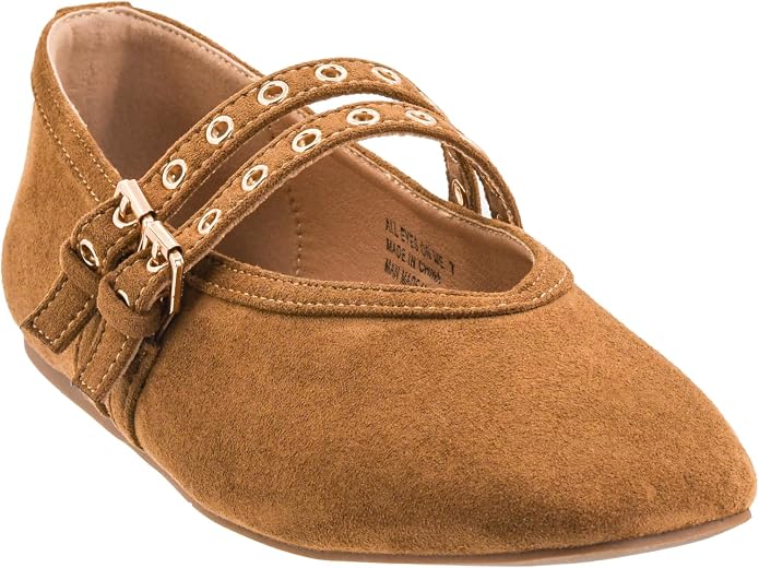 Faux suede camel flat with dual straps and buckles on a white background
