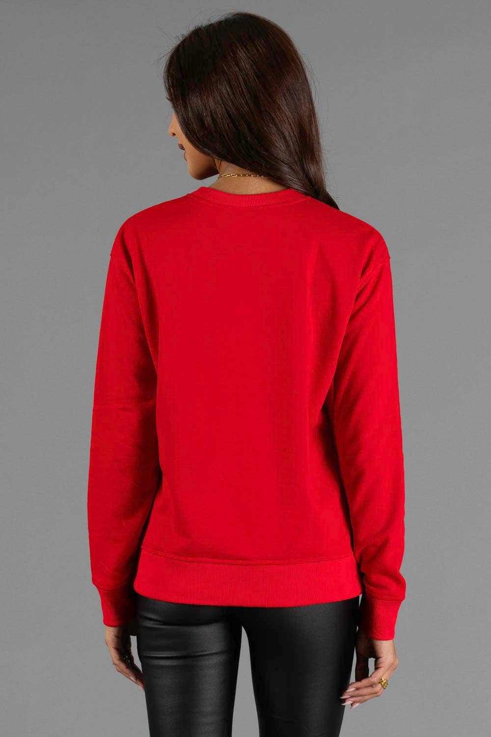 Back view of plain red Believe holiday crewneck sweatshirt