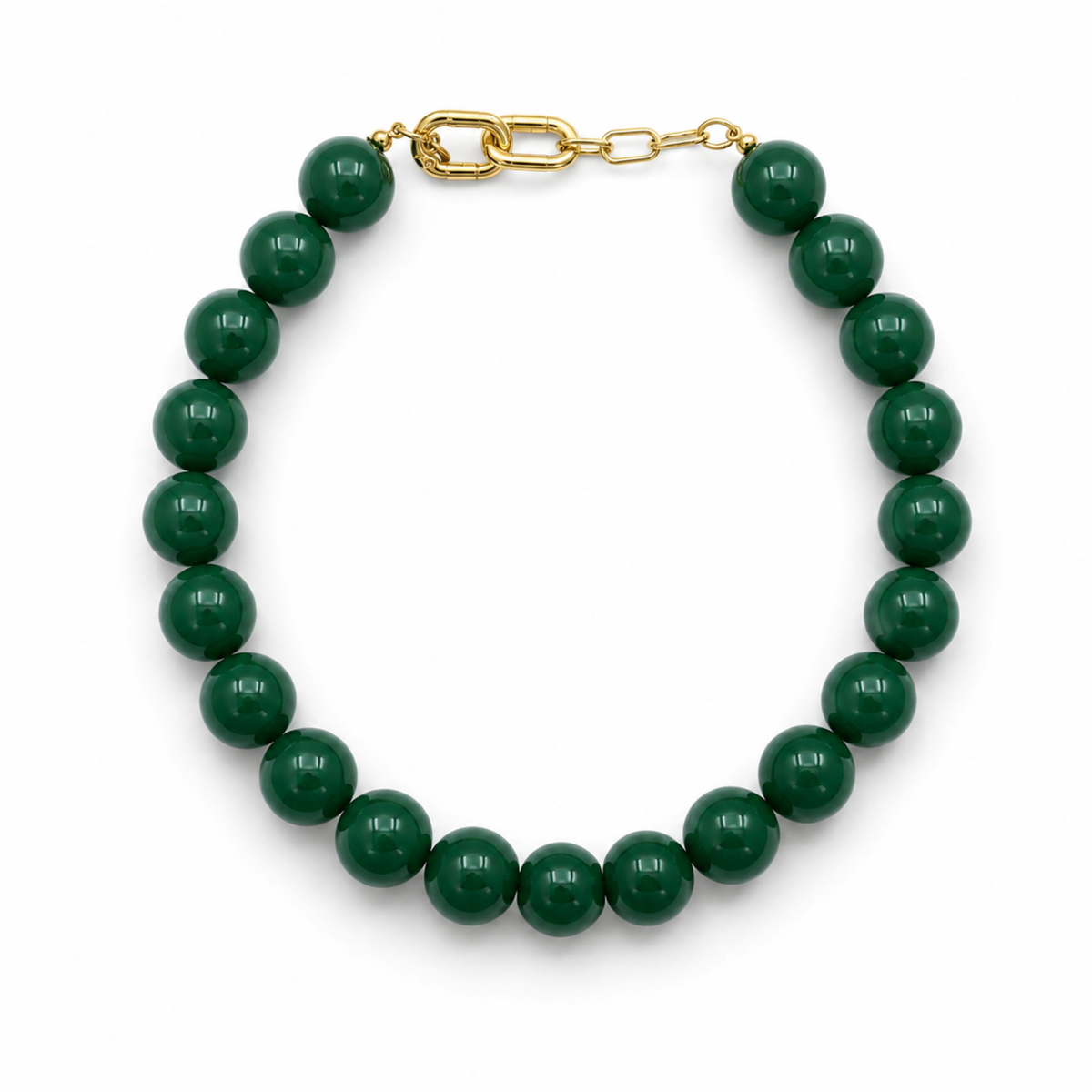 Green beaded bracelet with a gold clasp on a white background