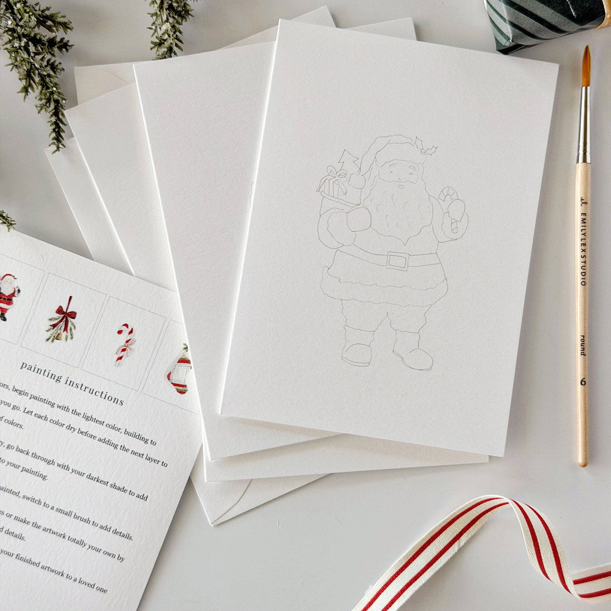 Lightly sketched Christmas notecards with instruction card