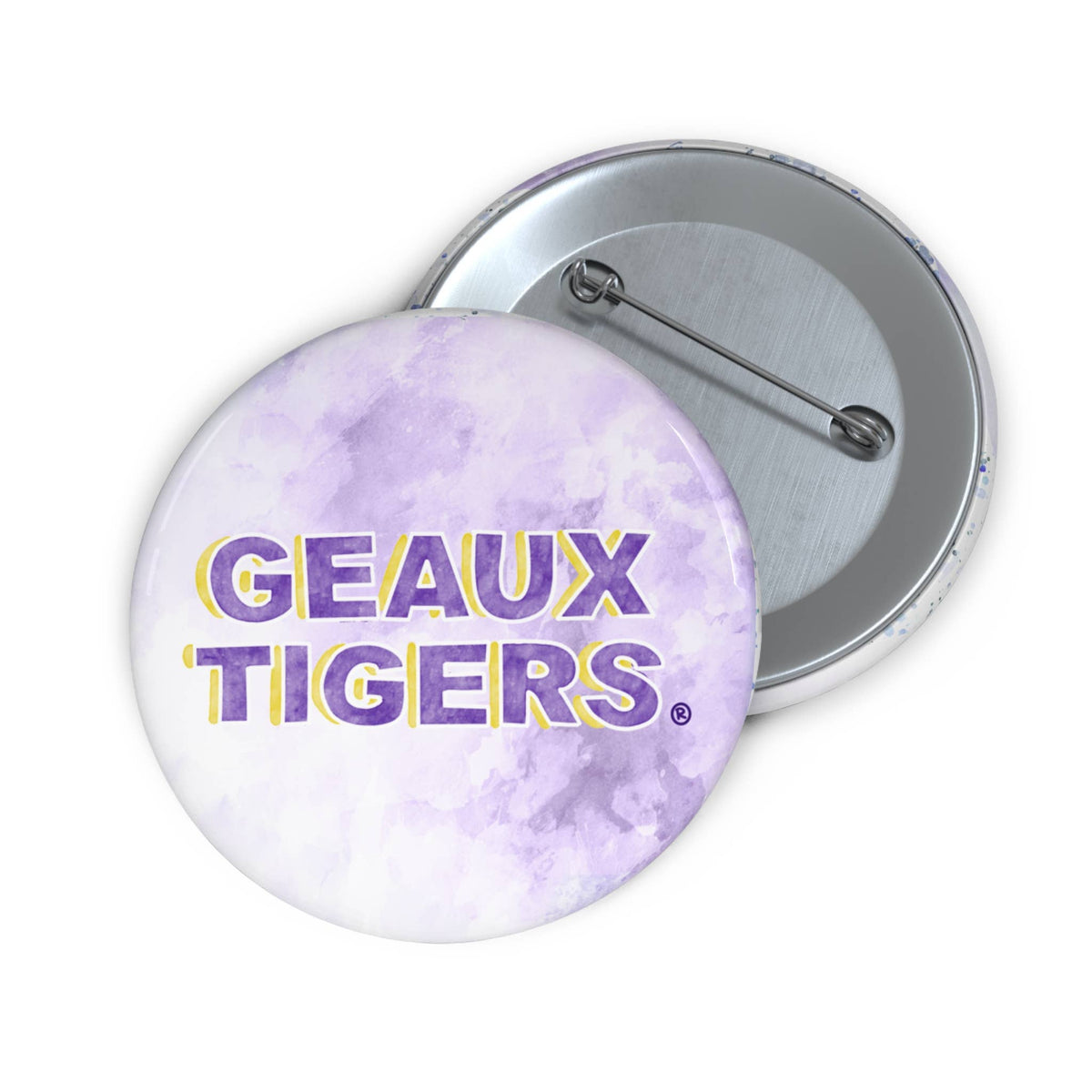 Button badge with 'GEAUX TIGERS' text on a purple and white marbled background