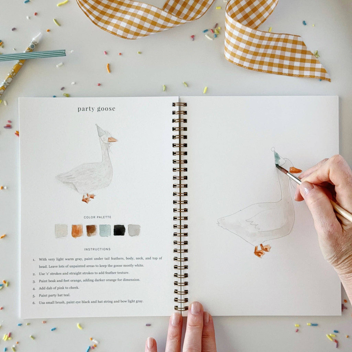 Goose in a party hat page with painted example