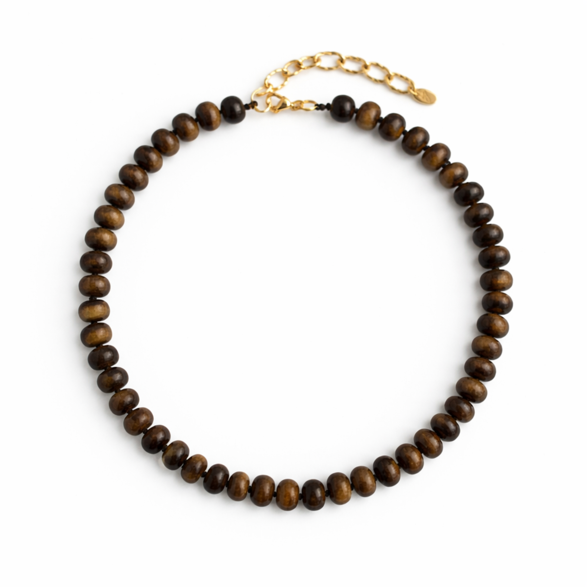 Wooden beaded necklace with a gold chain on a white background