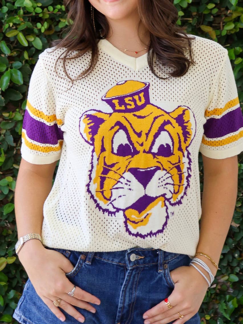 Girl wearing a Crochet knit top with Mike the Tiger 