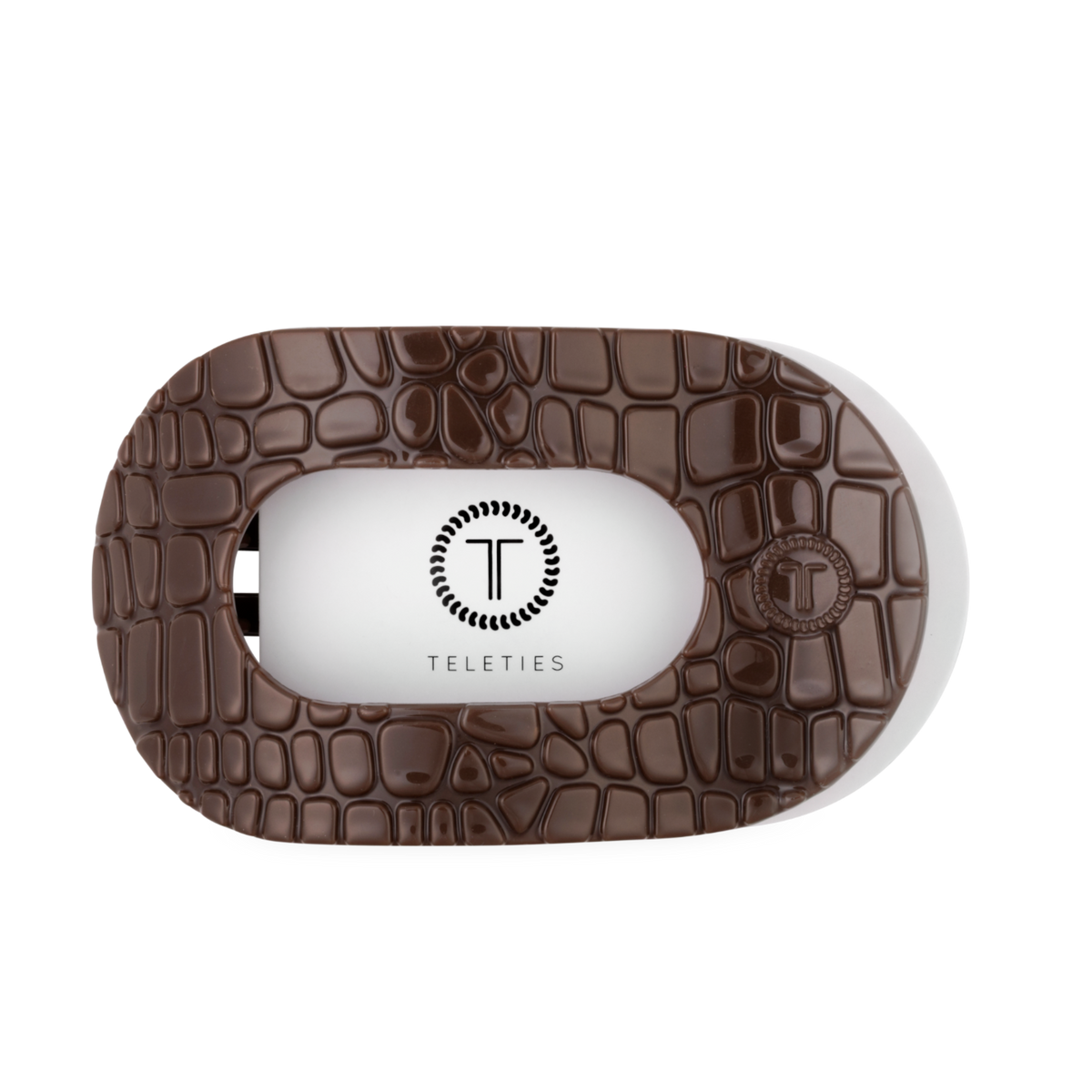 Underside of the Brown Crocodile large flat round hair clip showing the TELETIES logo