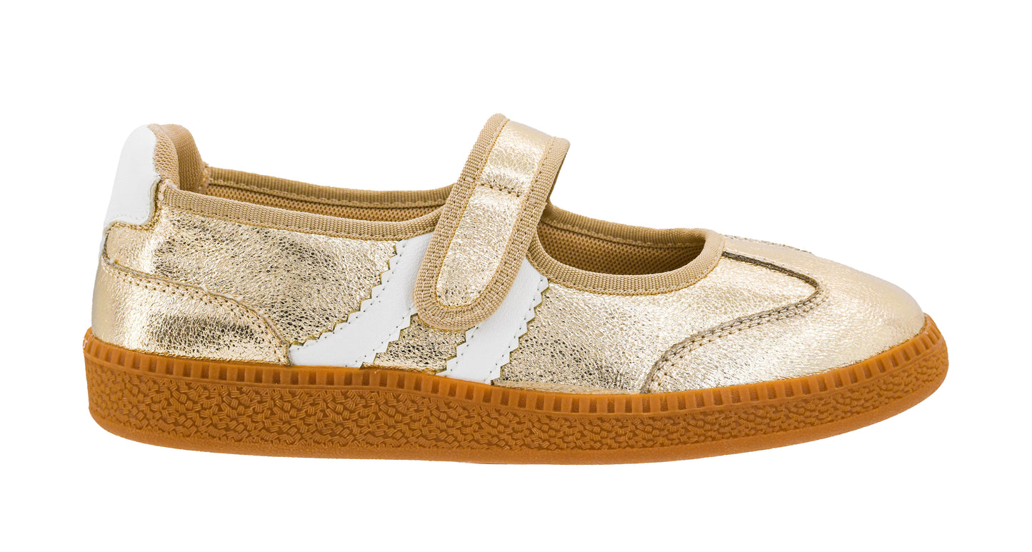 A single children's low-top shoe in metallic gold and white with a brown gum sole, shown from the side on a white background.