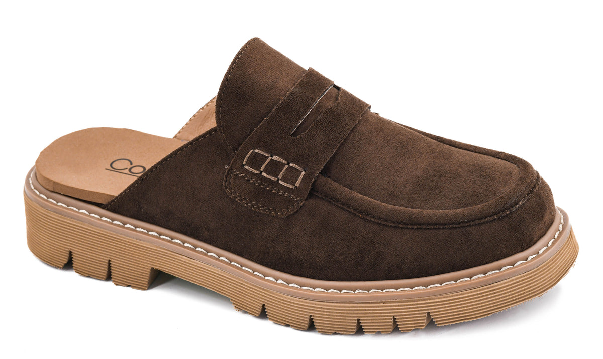 A dark brown suede mule slipper with a tan platform sole and a decorative strap across the instep, shown on a white background.