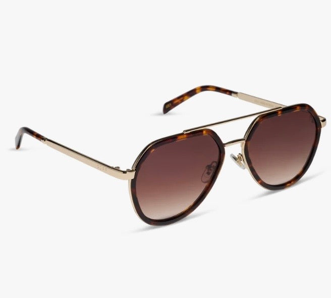 A pair of aviator-style sunglasses with brown gradient lenses, a gold-tone metal frame, and tortoiseshell acetate detailing on the rims and temples, shown on a light gray background.