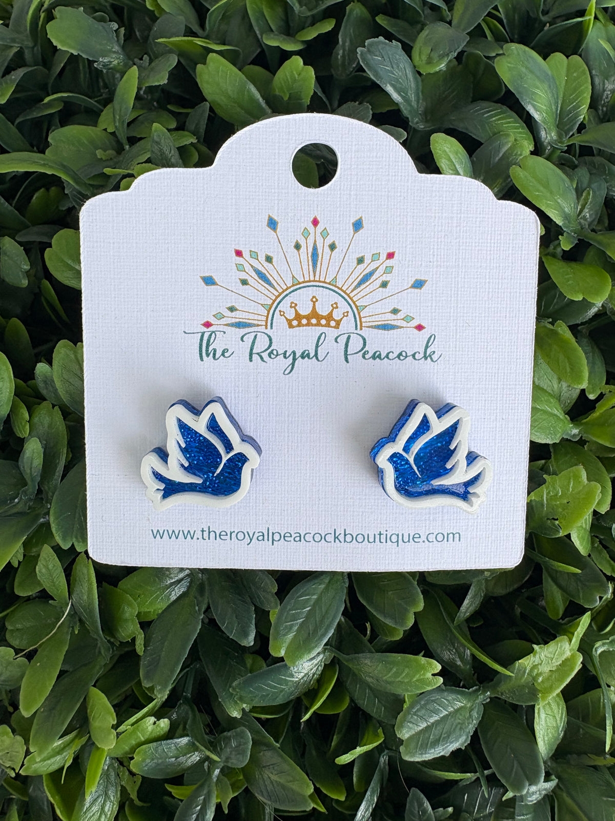 blue glitter dove stud earring with white outline
