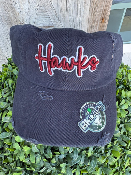 Navy blue hat with puff crimson Hawks outlined in white 