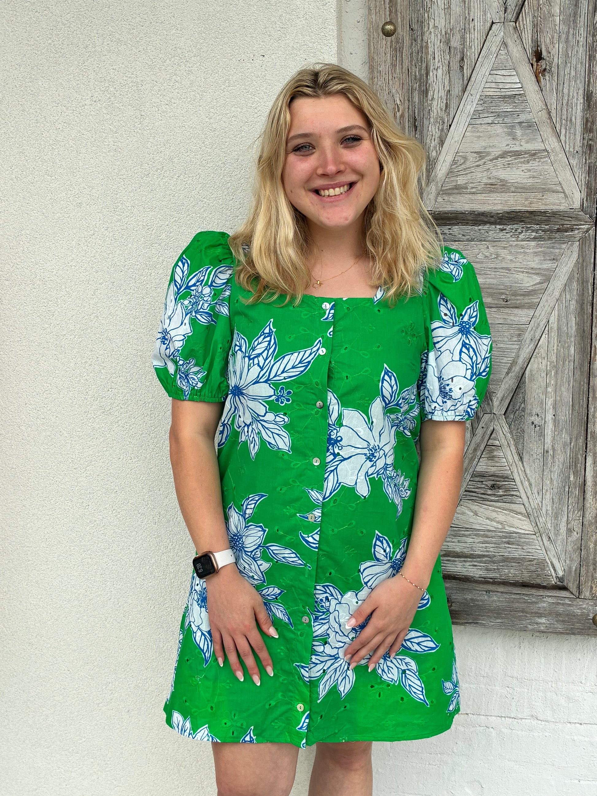 Woman wearing a green floral dress