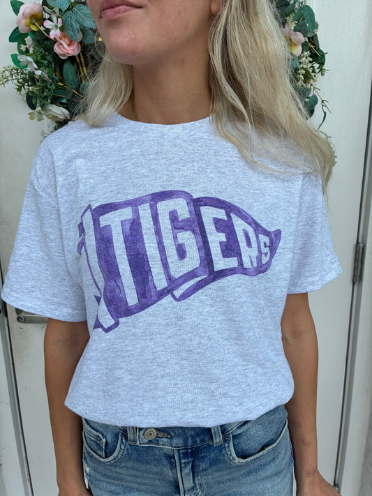 Heather gray t shirt with a watercolor artist painted design of a pennant flag with Tigers in purple