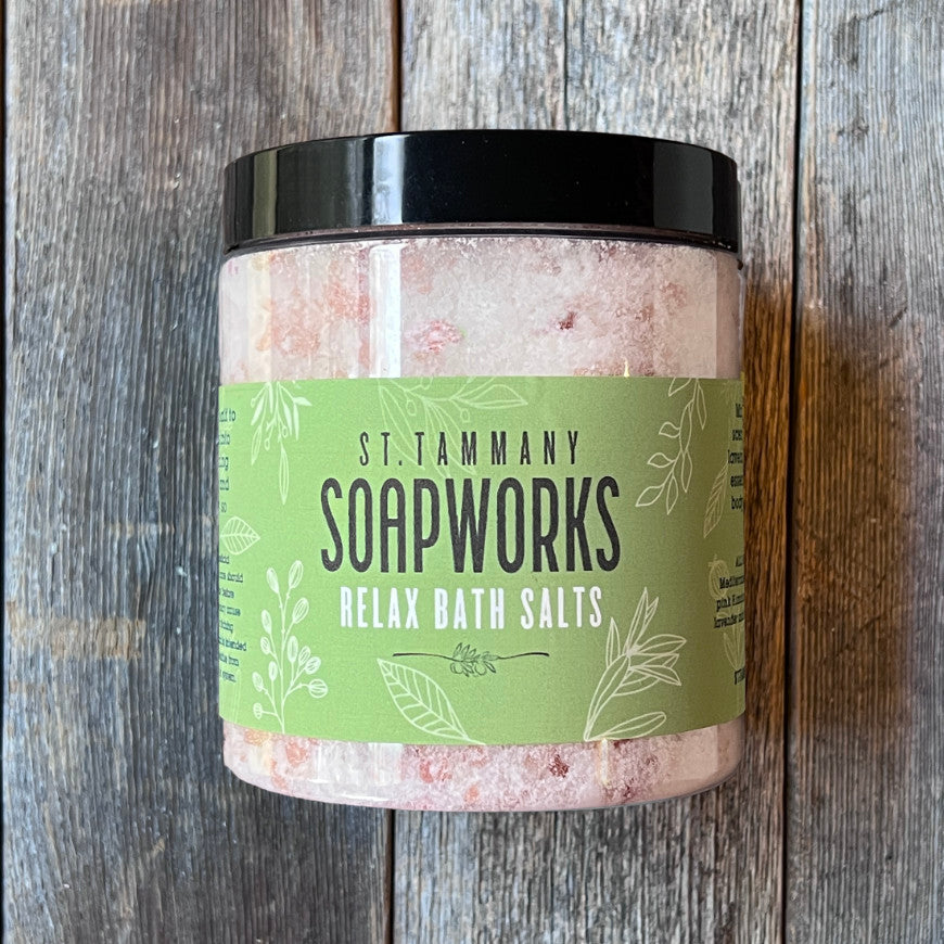 Jar of RELAX Bath Salts by St. Tammany Soapworks on rustic wood