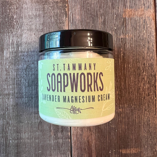 Jar of Lavender Magnesium Cream by St. Tammany Soapworks on rustic wood