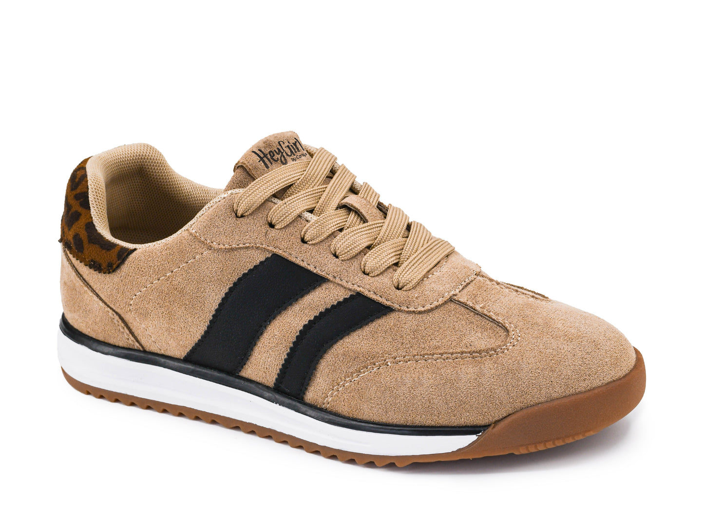 Beige sneaker with black stripe on a white background