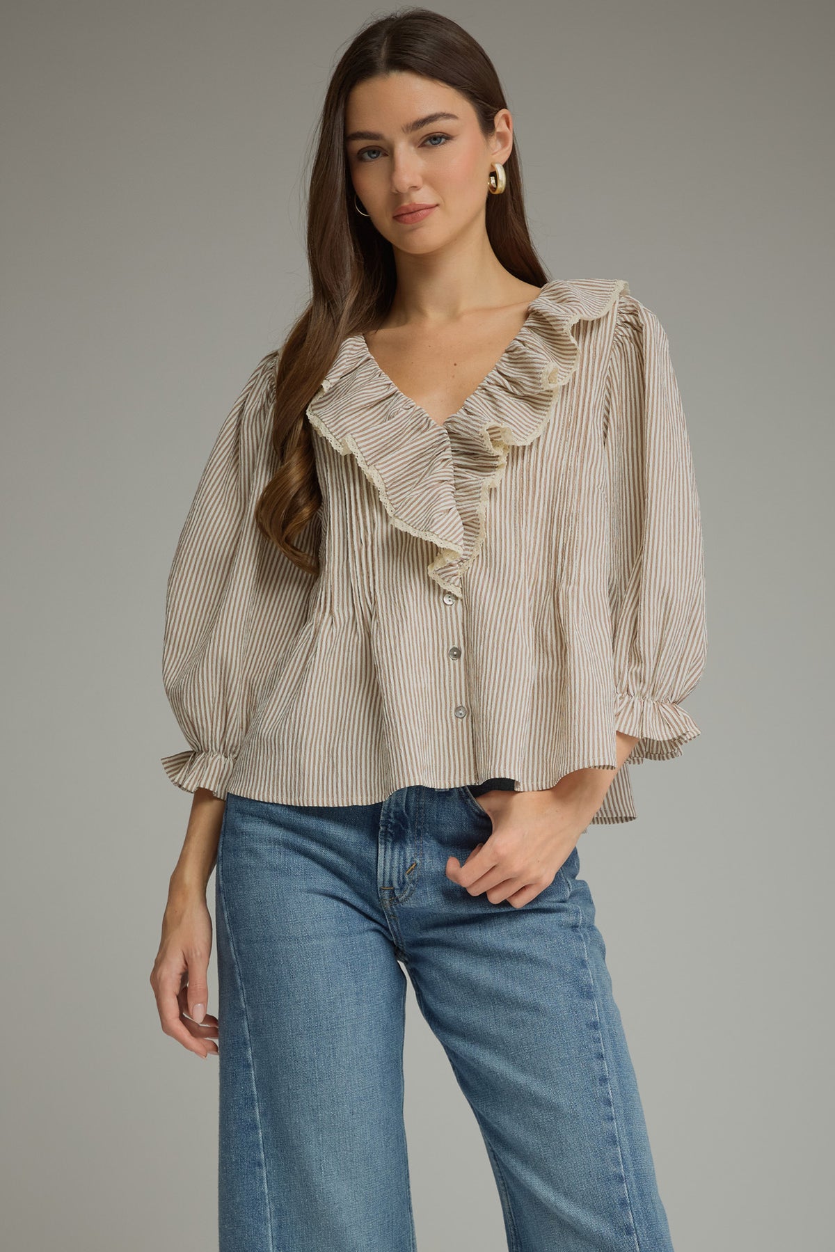 Brown and cream pinstripe ruffle V-neck blouse with balloon sleeves, front view