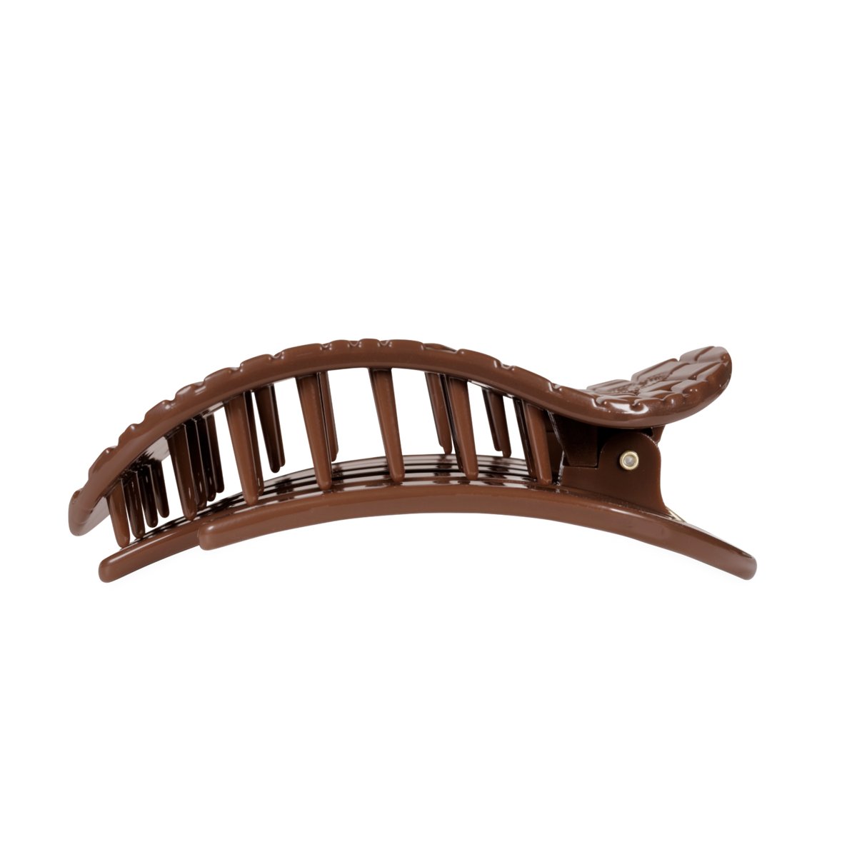 Side view of the Brown Crocodile large flat round hair clip showing its bendable teeth