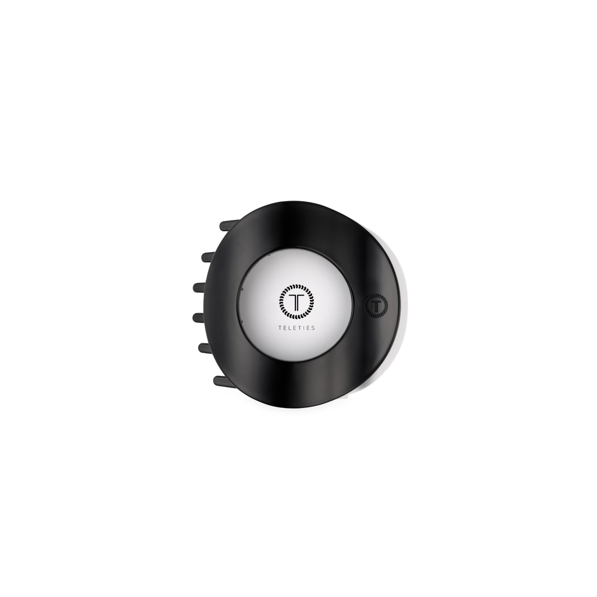 Underside of the Jet Black small flat circle hair clip showing the TELETIES logo