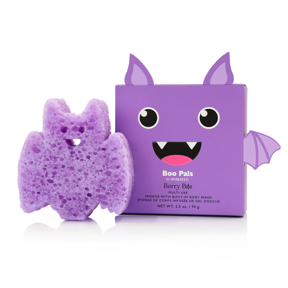 A purple bat-shaped sponge body wash bar displayed next to its purple cartoon box featuring a cute monster face. The box is labeled 'Boo Pais' and 'Berry Ride'.