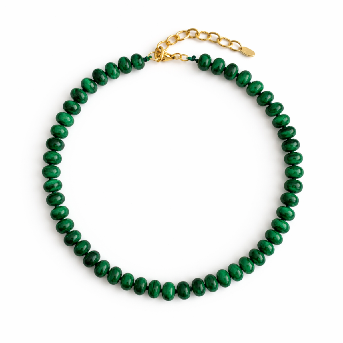 Green beaded necklace with a gold clasp on a white background
