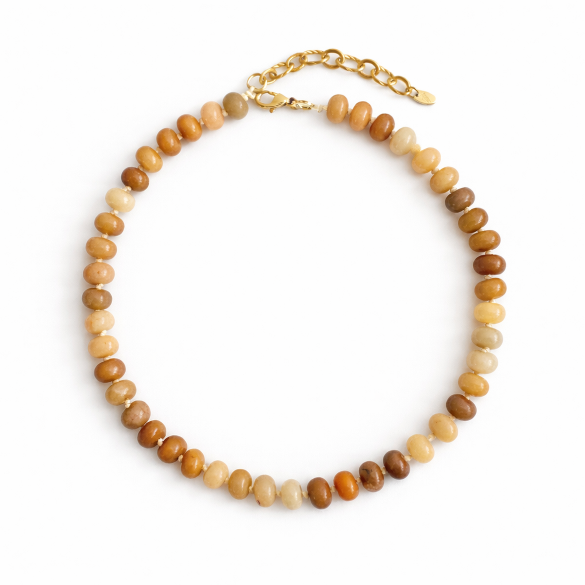 Beaded necklace with a gold chain on a white background
