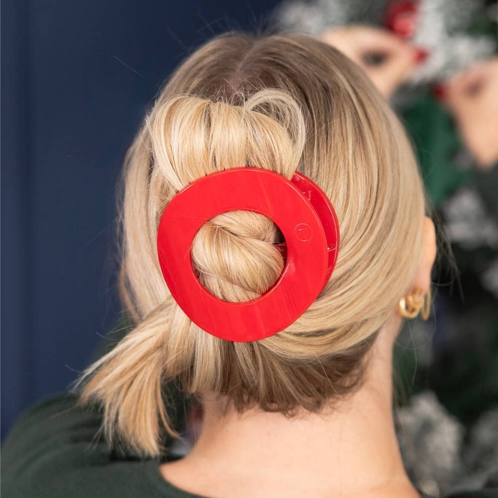 Three Red Carpet Ready flat circle hair clips grouped together