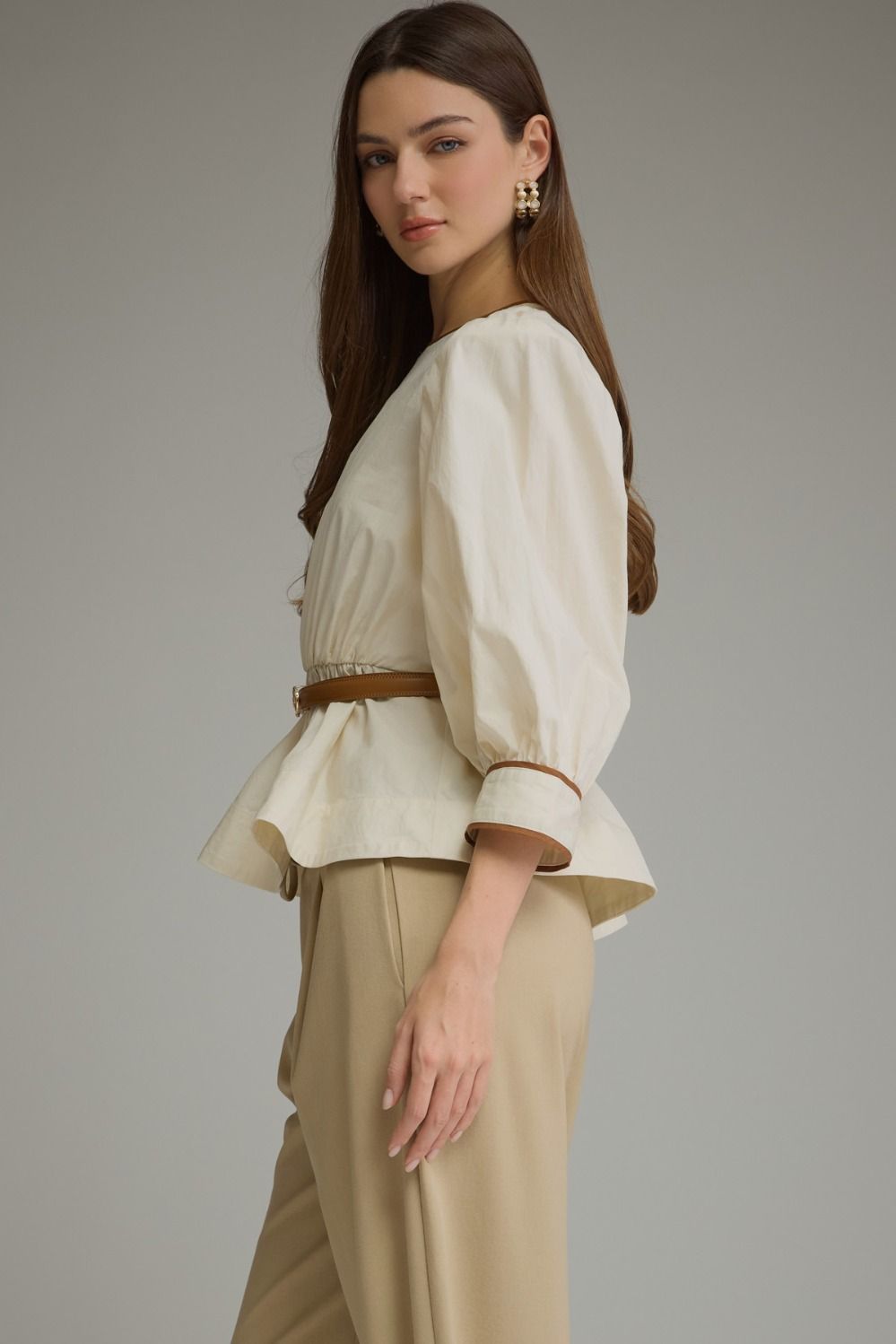 Ecru long puff sleeve top with detachable belt, three-quarter view