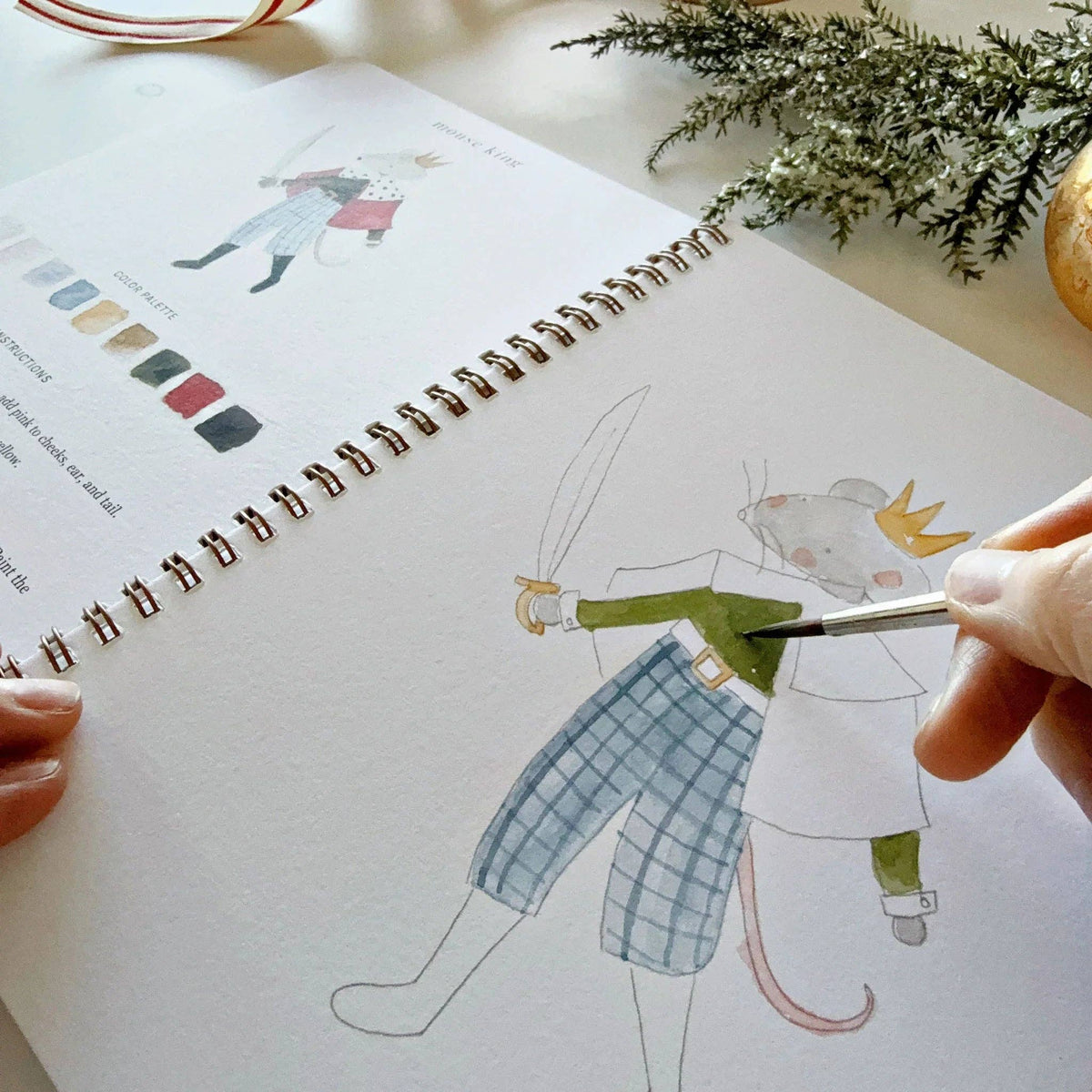 Painting the Mouse King in the Nutcracker workbook
