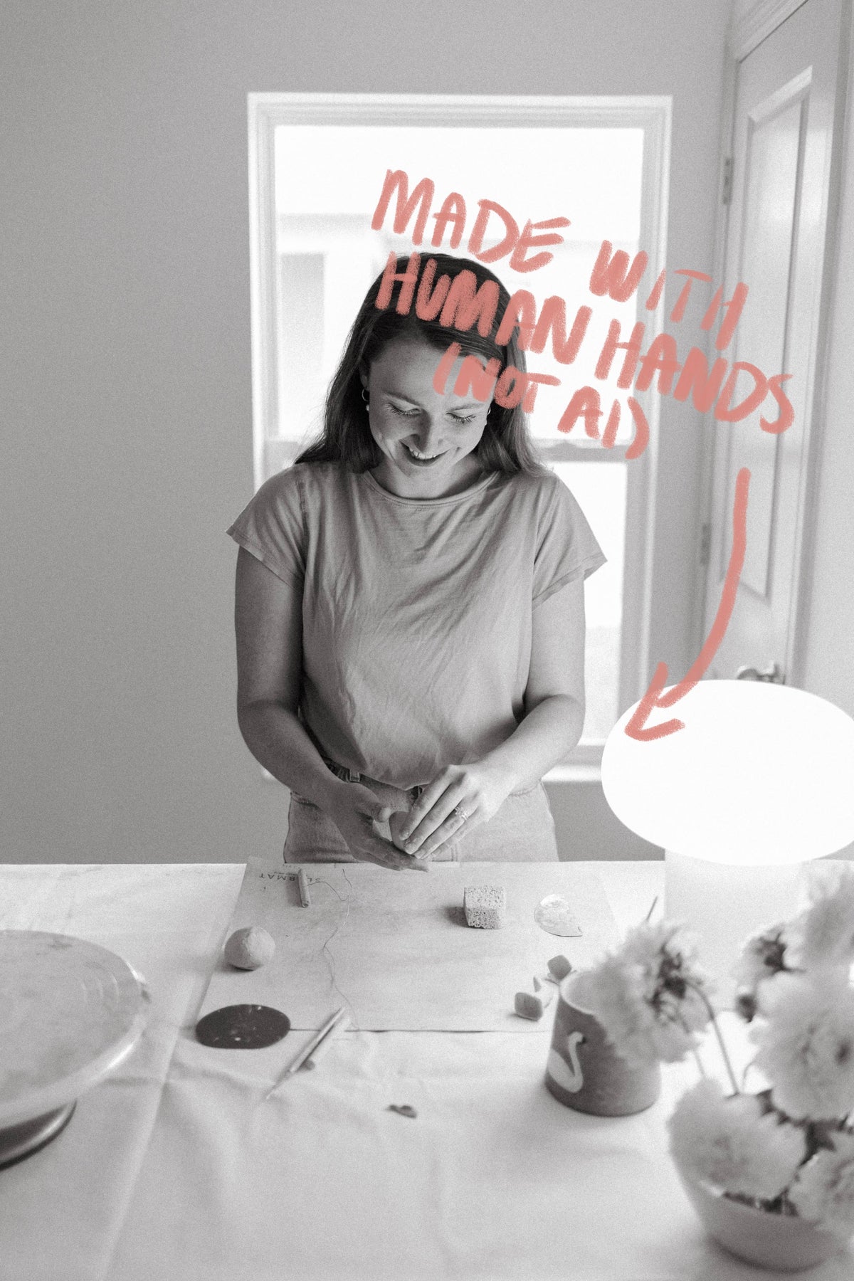 Black and white photo of the artist shaping ceramic goose dishes, labeled made with human hands