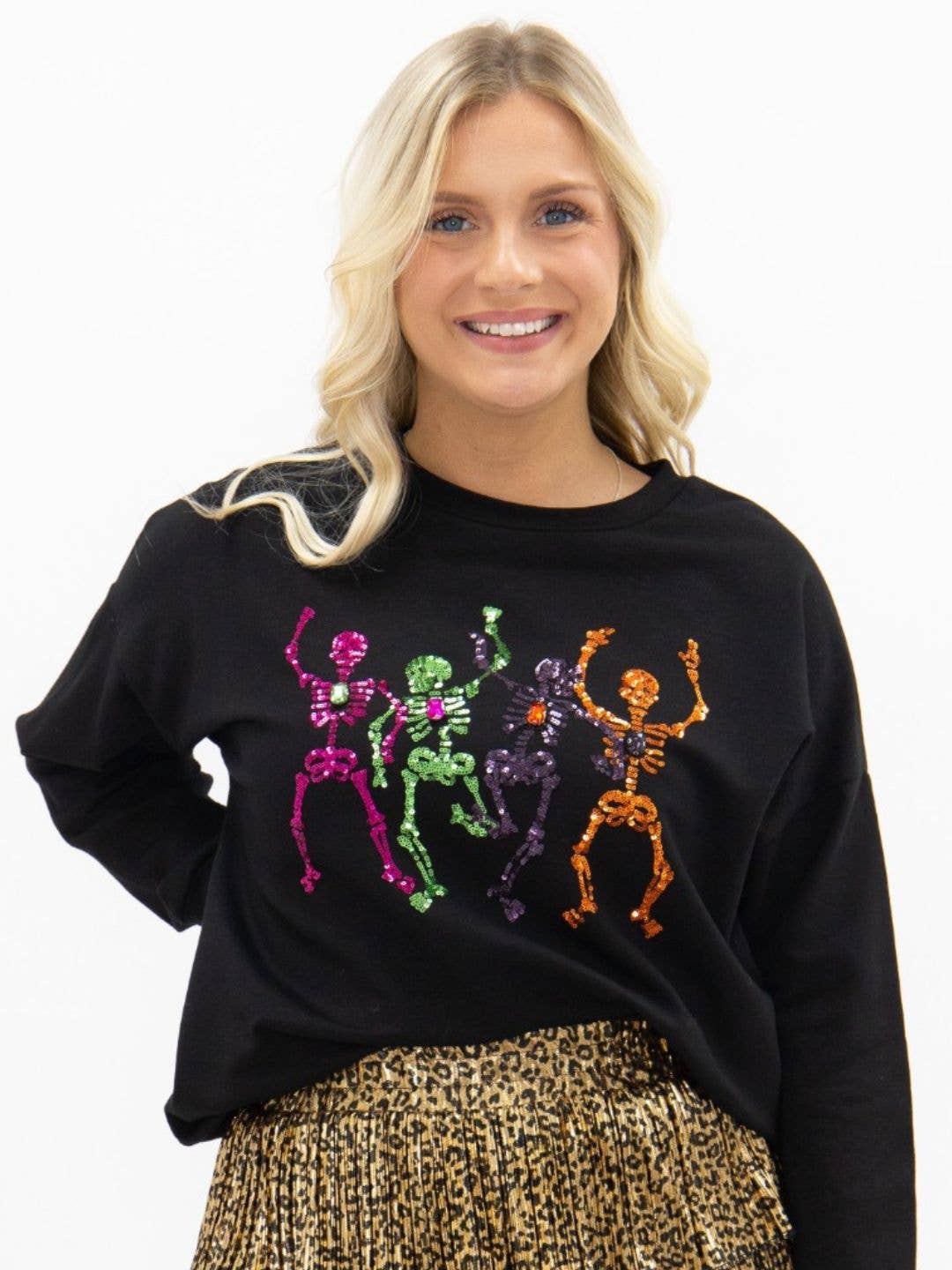 Dancing Skeletons on Black Top