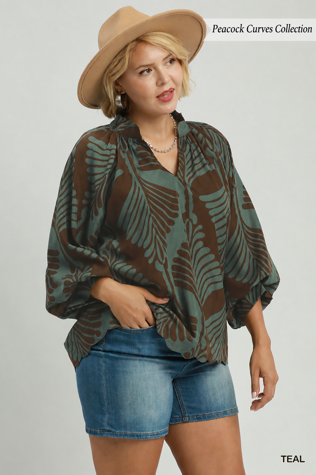 Teal print blouse with a brown abstract leaf print balloon long sleeves v neck