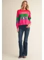 Front view of the Color Me Merry multicolor striped sweater with dark jeans