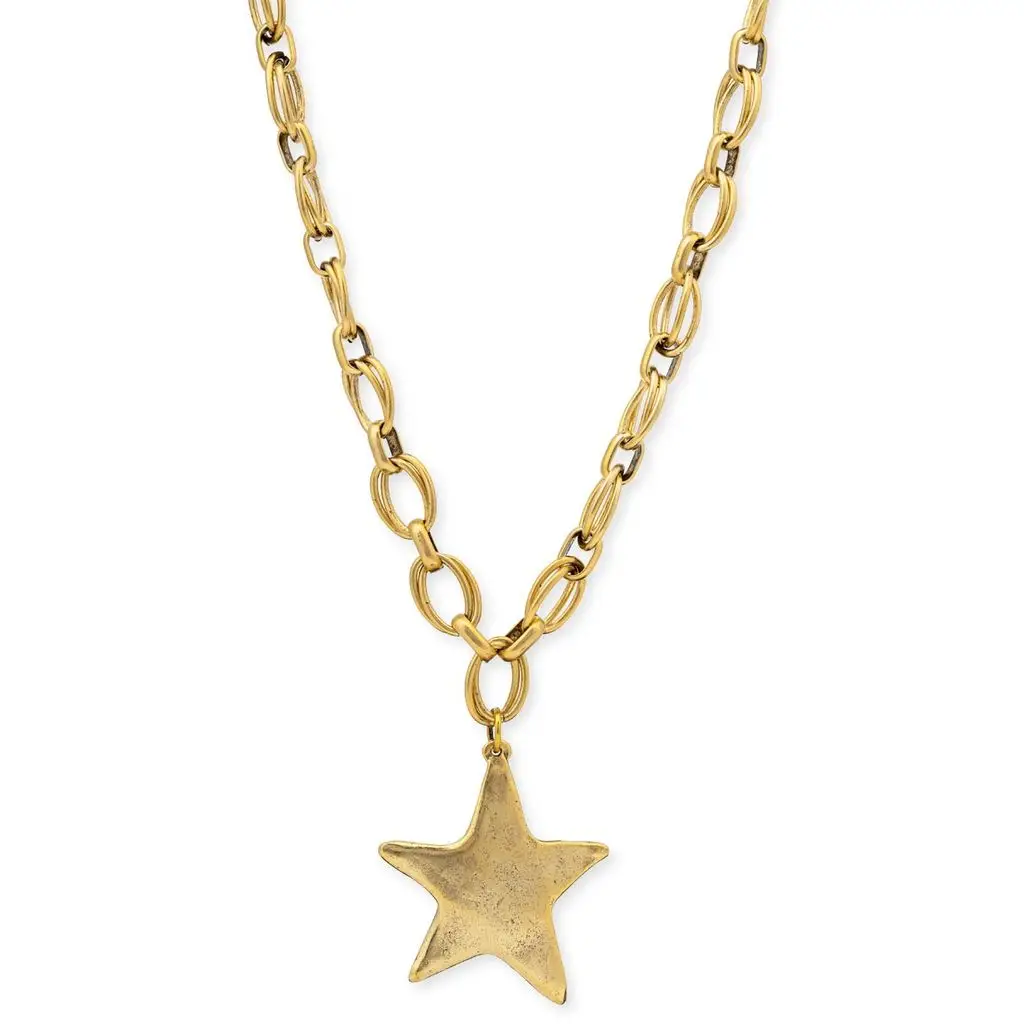 Gold star pendant necklace on a white background