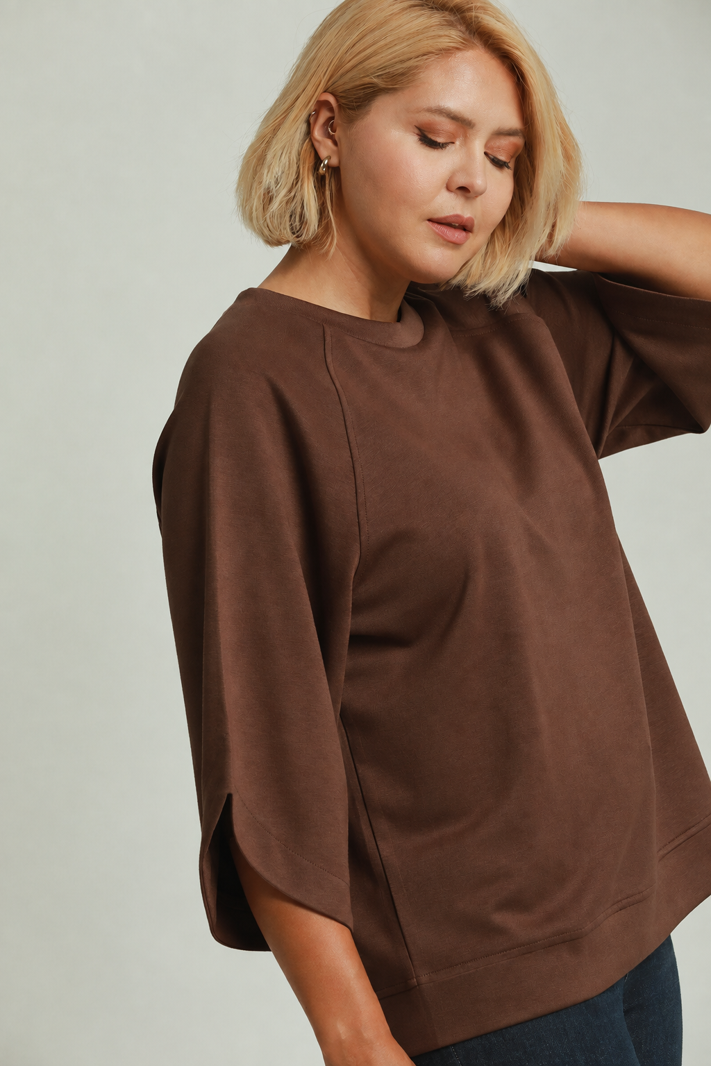 Model wearing the Cocoa Luxknit Round Hem Top